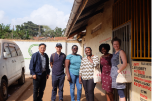 Six researchers standing in a line