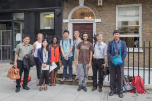 Group of researchers outside a building